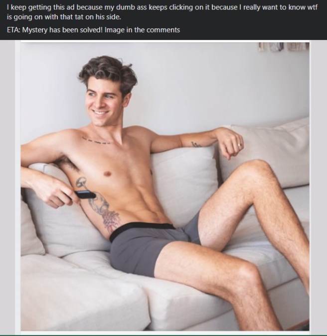 An underwear ad with a man sitting on a white couch in gray boxer briefs. The text above the image reads "I keep getting this ad because my dumb ass keeps clicking on it because I really want to know wtf is going on with that tat on his side. ETA: Mystery has been solved! Image in the comments."